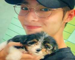 He has an adorable dog whom he call as Oreo Tang.